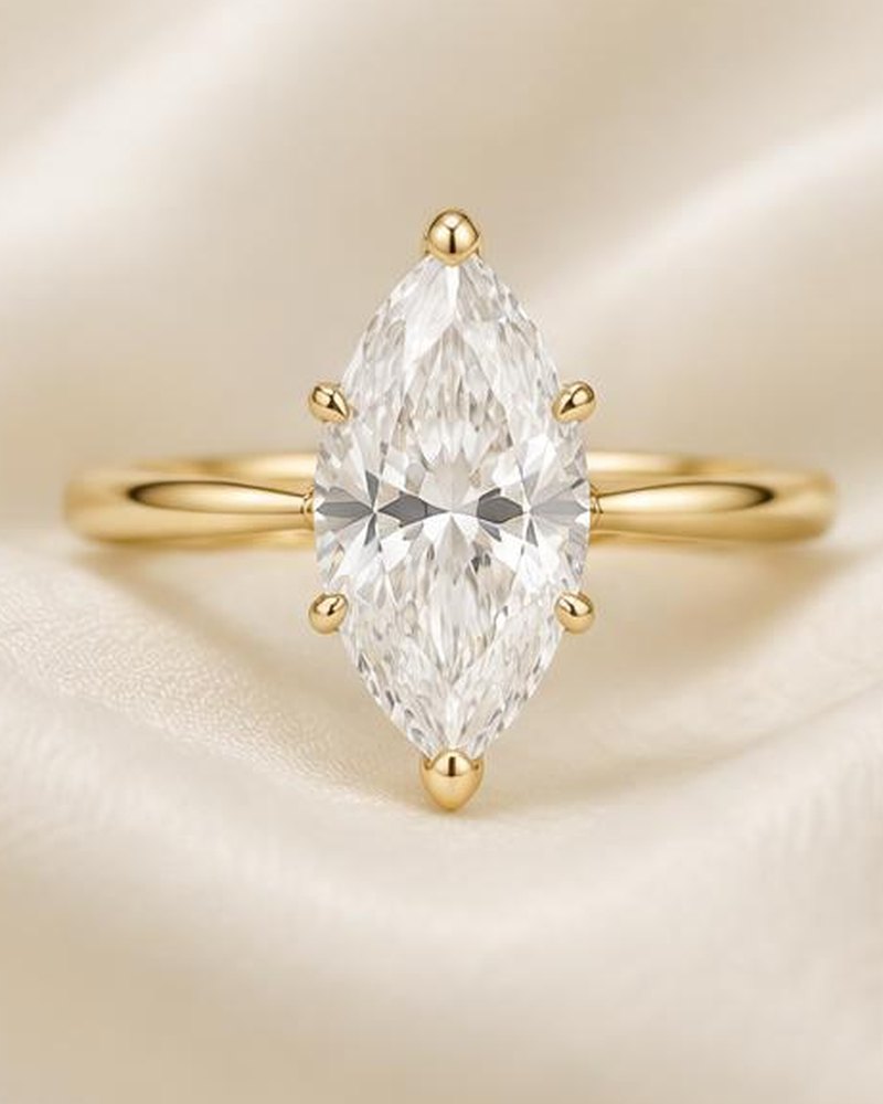 Gold Marquise Solitaire Engagement Ring