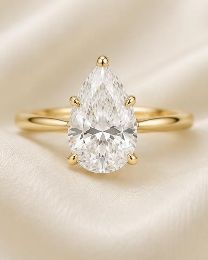 Gold Pear Solitaire Engagement Ring