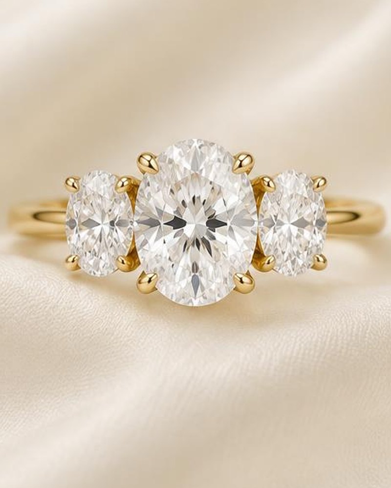 Gold Three-Stone Oval Engagement Ring